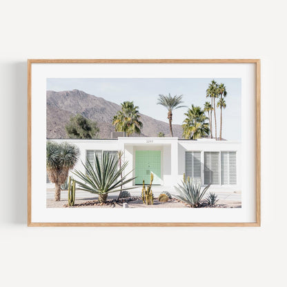 Serene Mint Green Door with Palm Oasis in Modern Desert Landscape