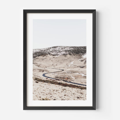 Serene Winter Landscape with Snow-Capped Mountains and Tranquil River