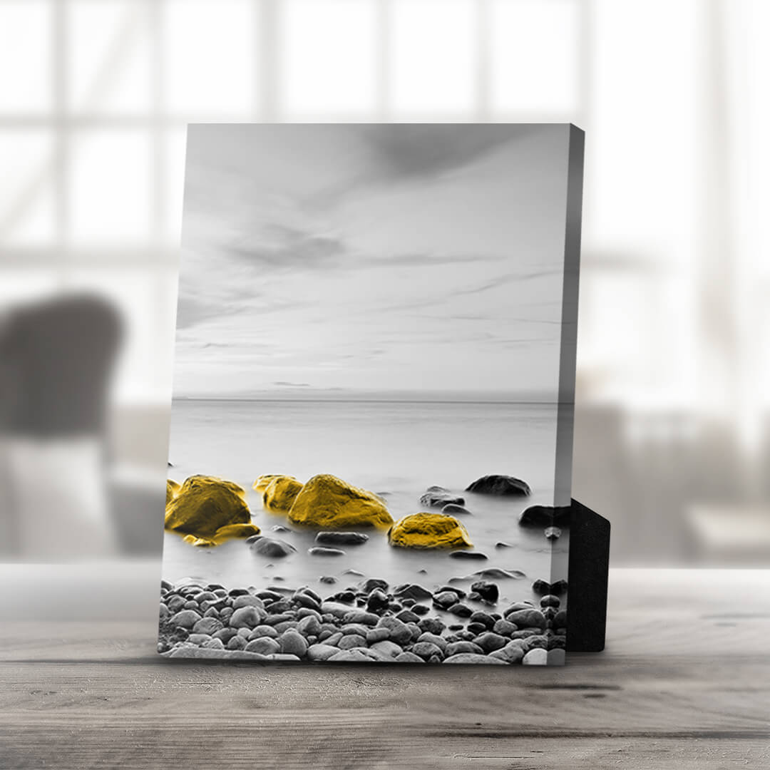 Vibrant Yellow Rocks on Serene Coastal Canvas Art